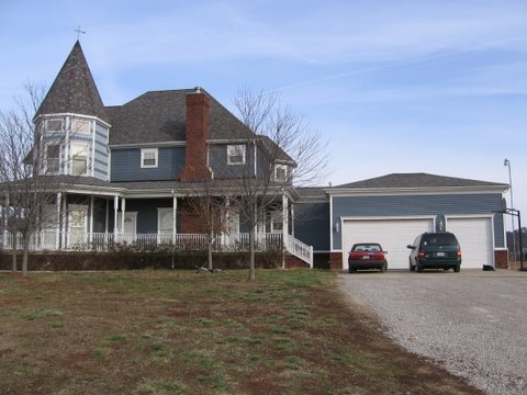 120 Acres On Highway 61 - Front view of house