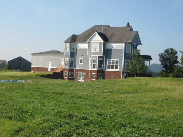 120 Acres On Highway 61 - Side view of house